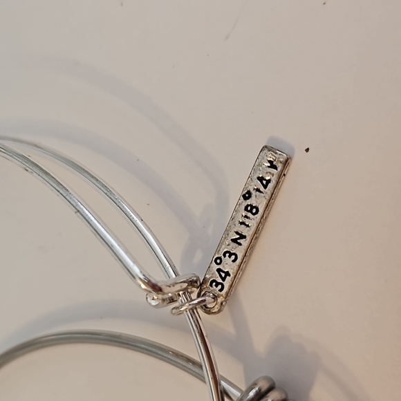 3 Charmed Silvertone Bracelets - Picture 3 of 10